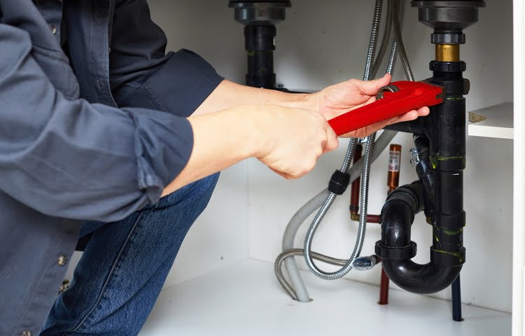A clogged P-trap may be one of the causes of kitchen sink leaking.