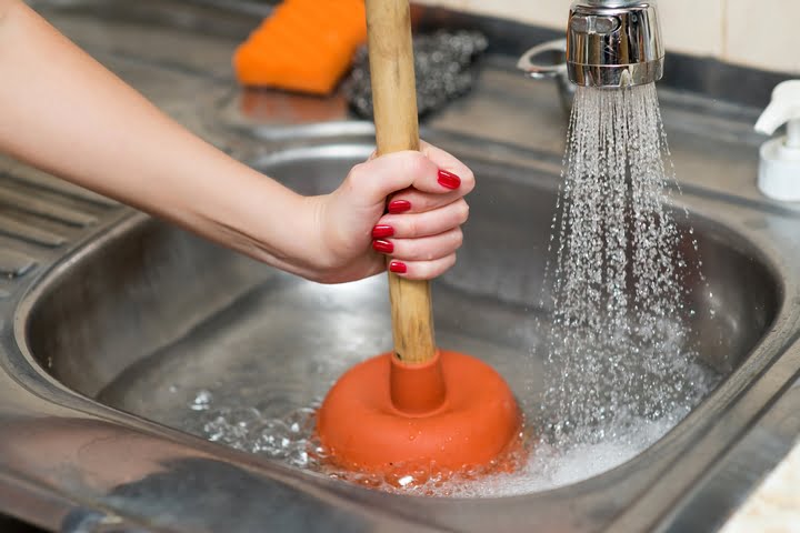 Plunger for unblocking clogged sink drain