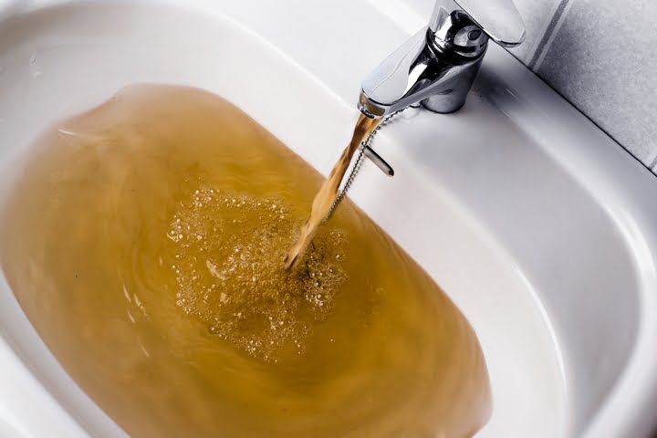 What is causing brown water from the tap