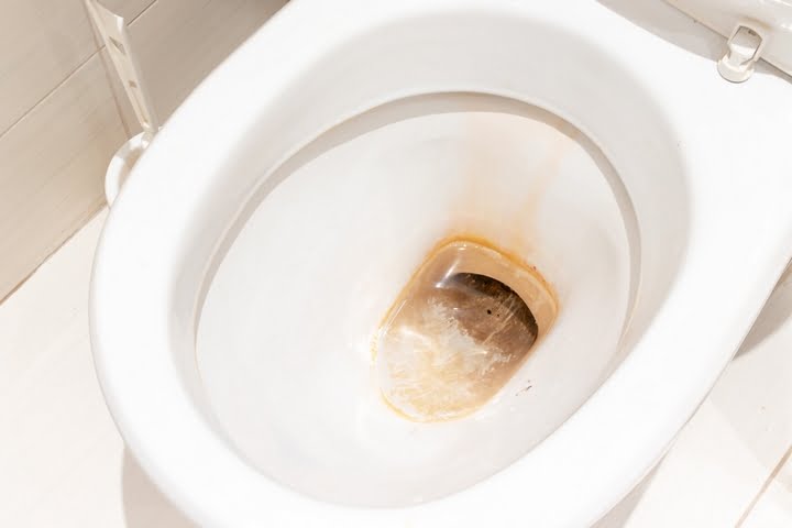 Mineral buildup is sometimes the cause of slow flushing toilets.
