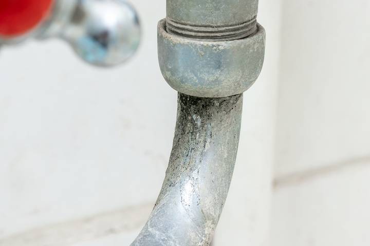 How to remove calcium buildup in pipes