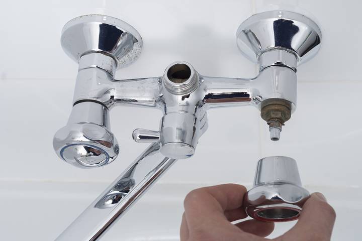 A poor shower washer installation may have caused a leaking tap.
