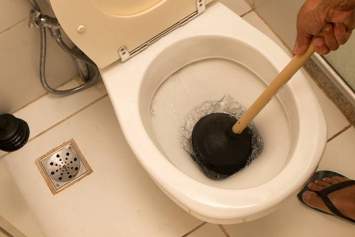 A blocked plumbing line may cause a bubbling toilet bowl.