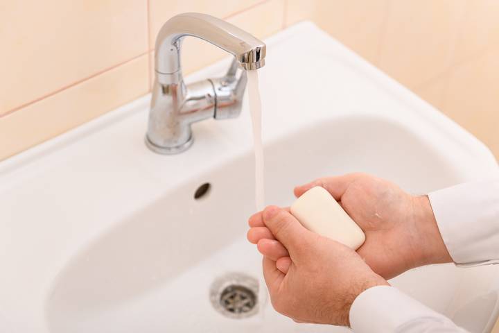 Soap scum might cause a slow draining sink in the bathroom.