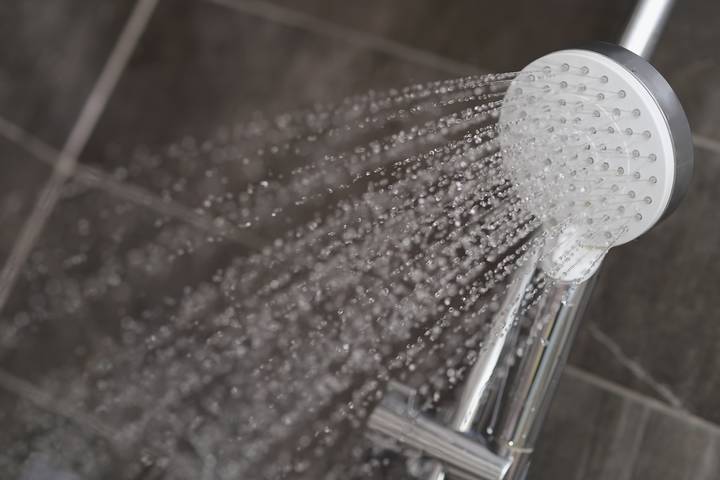 Leaking pipes might cause low water pressure in shower.