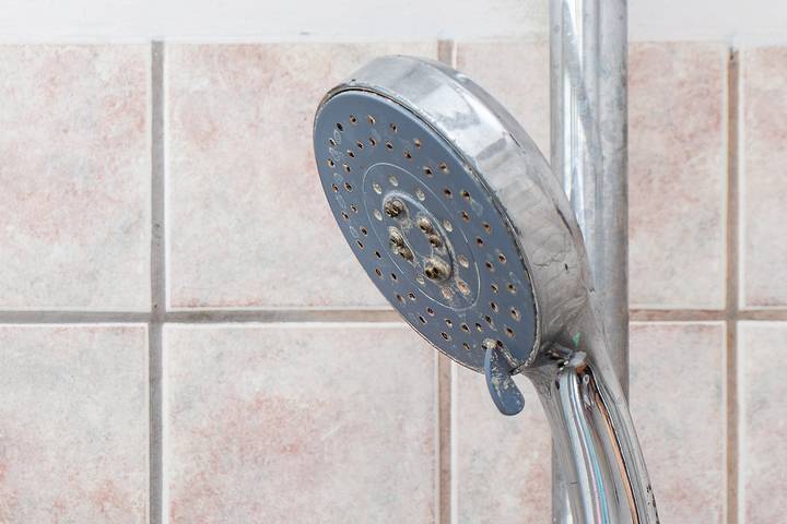 A broken hose might be the reason why a shower won't stop dripping.