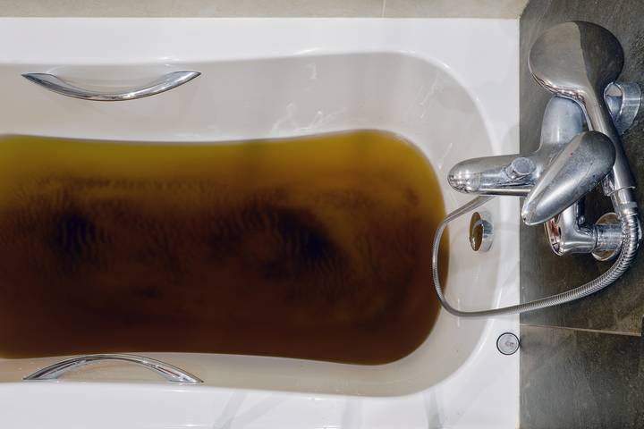 Septic tank back up has a correlation with a bathtub draining slowly.