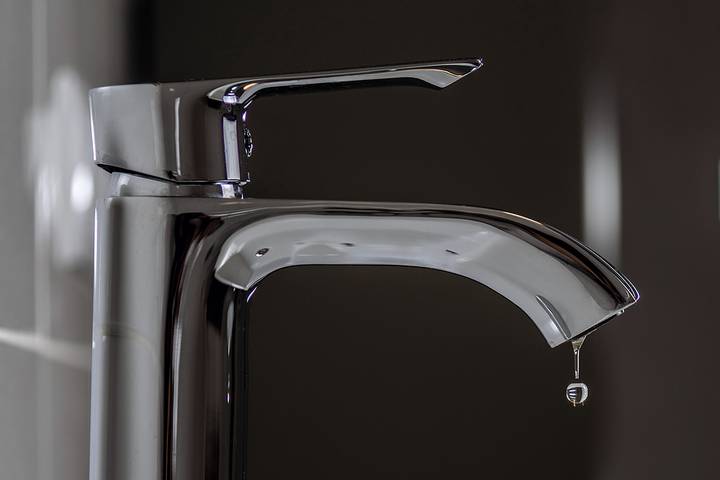 A dripping bathroom faucet may be due to damaged parts.