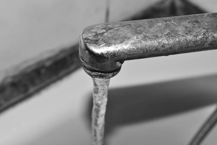 Old parts may cause a dripping faucet.