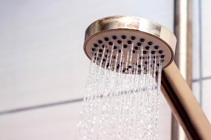 The anti-scald device may cause cold shower water.