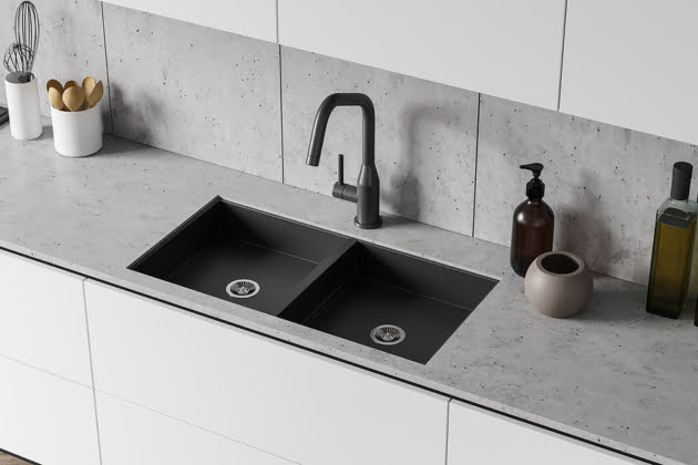 double kitchen sink backs up into other sink